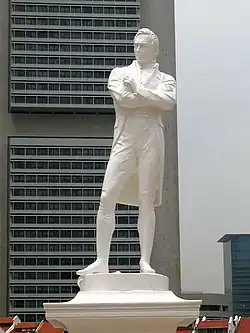 Image 30A statue of Raffles by Thomas Woolner now stands in Singapore, near Raffles's landing site in 1819. (from History of Singapore)