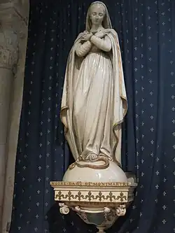 A statue of Our Lady of Montmartre, patron saint of the artists of Montmartre
