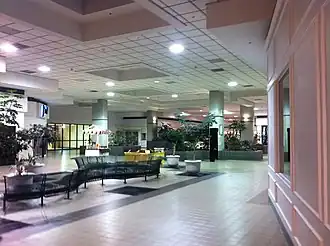 An interior shot of Staunton Mall, showing a corridor with several storefronts