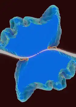 Central star has elongated S shaped curve of white emanating in opposite directions to the edge. A butterfly-like area surrounds the S shape with the S shape corresponding to the body of the butterfly.