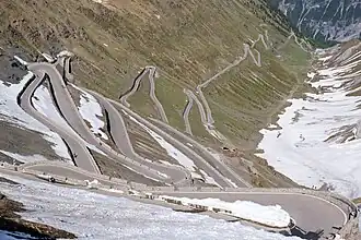 A mountain pass with paved roads.