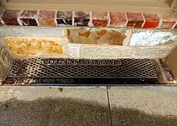 Citizens National Bank cast iron threshold sill at Stonewall Saloon