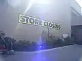 Huge "STORE CLOSING" banner near main entry