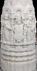 Pillar carving depicting Swaminarayan and Paramhansas