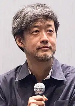 A photograph of Takashi Yamazaki at the Yebisu Garden Cinema in 2018