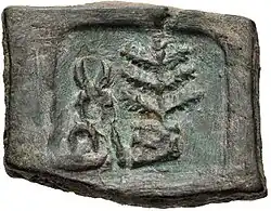 Taxila coin with hill and tree-in-railing (185-168 BCE).