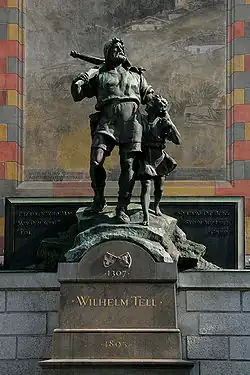 Image 17Although there is reasonable doubt whether William Tell ever lived at all, the legend itself had a great impact on the history and culture of Switzerland (statue in Altdorf). (from Culture of Switzerland)