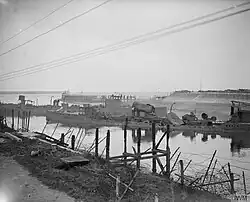 Wrecks of Iphigenia and HMS Intrepid blocking the mouth of the Bruges Ship Canal at Zeebrugge, 24 October 1918.