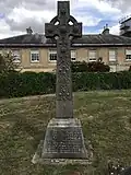 The grave of George Finch in the churchyard of Holy Cross Church, Burley