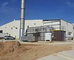 a smokestack attached to a metal box