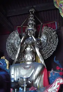 Statue of the Thousand-Armed and Thousand-Bowl Mañjuśrī in Xiantong Temple at Mount Wutai, China