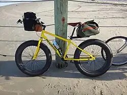 TommiSea Fat Sand Bike equipped for long-distance beach trekking, photographed at the Virginia-North Carolina border.