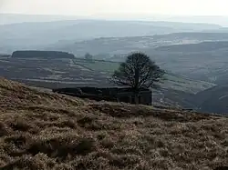 A ruined farmhouse on the moors.