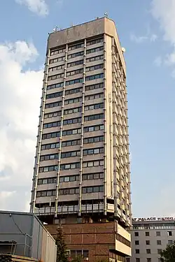 A tall, though thin concrete structure