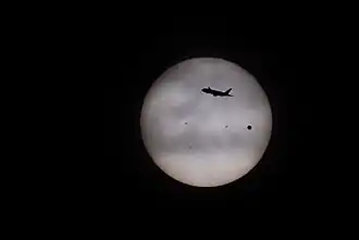 San Francisco, California, United States Transit of airliner with Venus