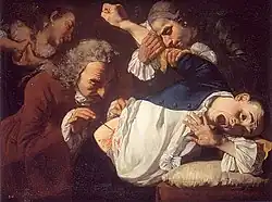 Surgeon inspects Wound