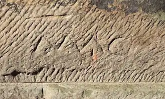 Roman mason's mark at the Porta Nigra in Trier, Germany
