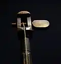 The single tuning peg of a tromba marina, turned by hand