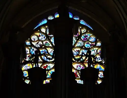 The west rose window (partly hidden by organ)
