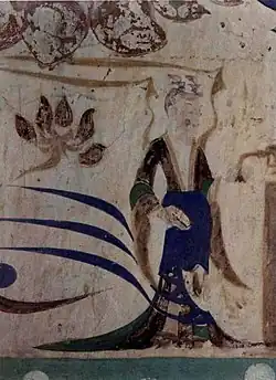 Mogao fresco of a woman dressing in Swallow-tailed Hems and Flying Ribbons clothing, Western Wei dynasty (535–557)