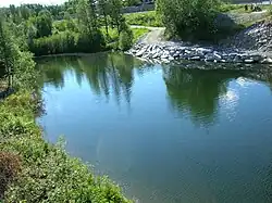 Before the bridge the river is called Tverråga