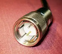 Twinaxial cable connector, a male plug