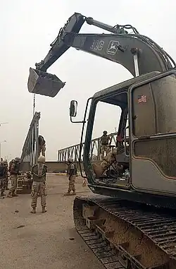 U.S. Navy Seabees attached to Naval Mobile Construction Battalion 133 rebuild Sarabadi Bridge