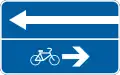 Entrance to a road with one-way traffic and an oncoming bicycle lane (left)