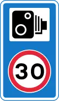 Speed camera ahead with reminder of 30 mph (48 km/h) speed limit