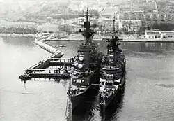 USS Little Rock and USS Albany docked at the refueling pier at Gaeta, Italy in 1976.