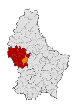 Map of Luxembourg with Useldange highlighted in orange, and the canton in dark red