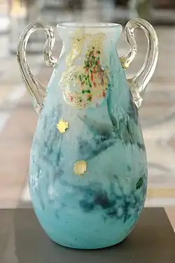 Vase with lilies and daises, multi-layered blown crystal with inclusions of glass and gold dust, cabochons and handles added on and fused (1896) (Petit Palais)