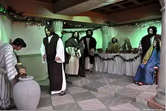 Scene 12: The transformation of water into wine at the Wedding at Cana