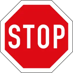 The standard international stop sign, following the Vienna Convention on Road Signs and Signals of 1968