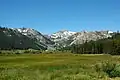 Washeshu Peak centered in the distance, viewed from Olympic Meadow