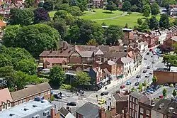 Looking east over Sidbury Gate from the cathedral's tower. The Commandery and remainder of its park