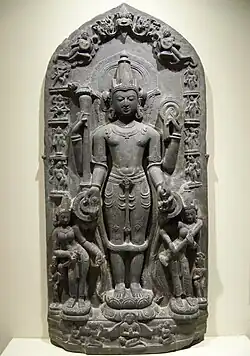 11th-century Vishnu sculpture the goddesses Lakshmi and Sarasvati. The edges show reliefs of Vishnu avatars Varaha, Narasimha, Balarama, Rama, and others. Also shown is Brahma. (Brooklyn Museum)[190]