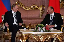 Vladimir Putin and Romanian President Traian Băsescu at the 2008 Bucharest summit