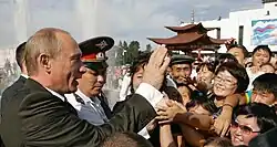 Putin with local people in the Siberian republic of Tuva in 2007
