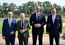 Miloš Vučević, Olaf Scholz, Aleksandar Vučić, and Maroš Šefčovič at a meeting
