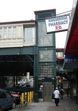 An elevator on the sidewalk outside the 231st Street station, leading up to the platform
