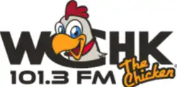 Black text reading "WCHK 101.3 FM" with a happy chicken seen through the "C". Also yellow text reading "The Chicken"