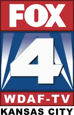 From top to bottom: a red box containing the Fox logo in white; a blue box with sublimated blue searchlights either side and a large white bold sans-serif numeral 4; and a red box with the call letters "W D A F - T V" in white. Beneath are the words "Kansas City" in black bold sans-serif.