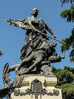 Sculptural group topping off the monument