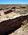 Puerco Pueblo walls of up to 125 rooms at the Petrified Forest National Park[9]