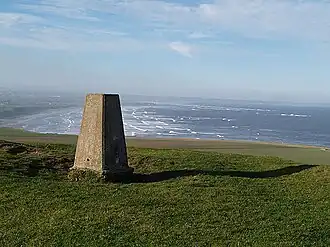 A high point overlooking a bay and a tidal sea