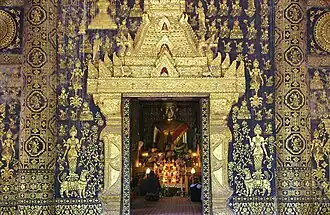 Golden outer wall of Wat Xieng Thong