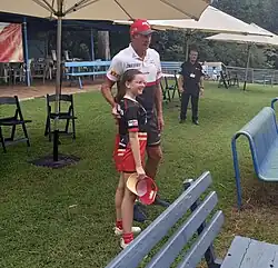 Bennett and a Dolphins fan in Brisbane 2024