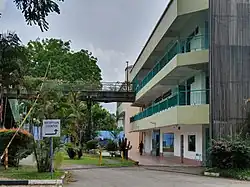 The West Coast Recreation Centre, closed for demolition. Northeast side, where the overhead bridges lead to. The former Jack's Place is seen with the green entrance on the ground floor.