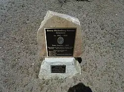 NRHP plaque in the entrance of the Henry Wickenburg Pioneer Cemetery. The cemetery was listed in the National Register of Historic Places April 4, 2011. Reference #11000151.